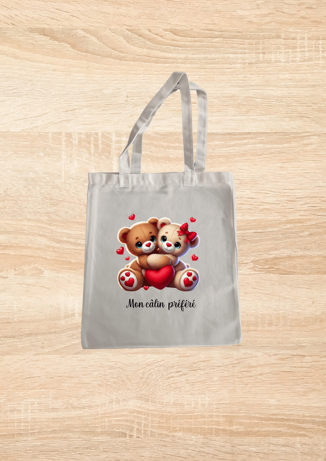 Sac fourre tout motif ourson qui se câline